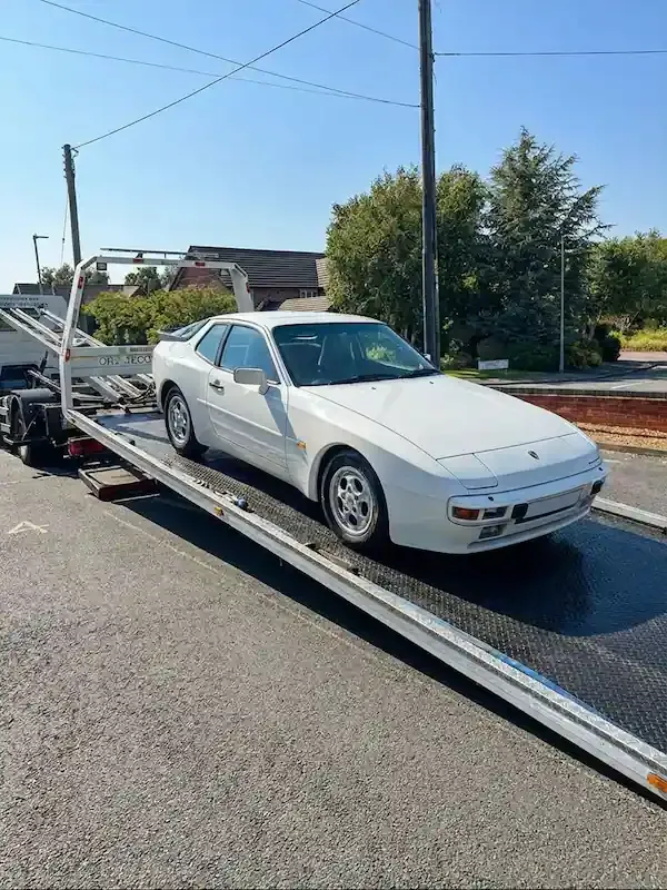 Porsche 944 classic car transport on flatbed